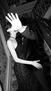 Couple on stairs romantic engagement session in Barcelona