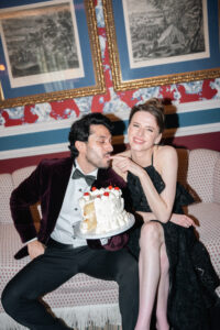 Bride and groom cutting cake at wedding in Madrid