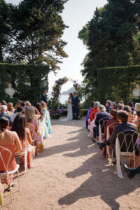 Outdoor wedding ceremony in Costa Brava with guests seated