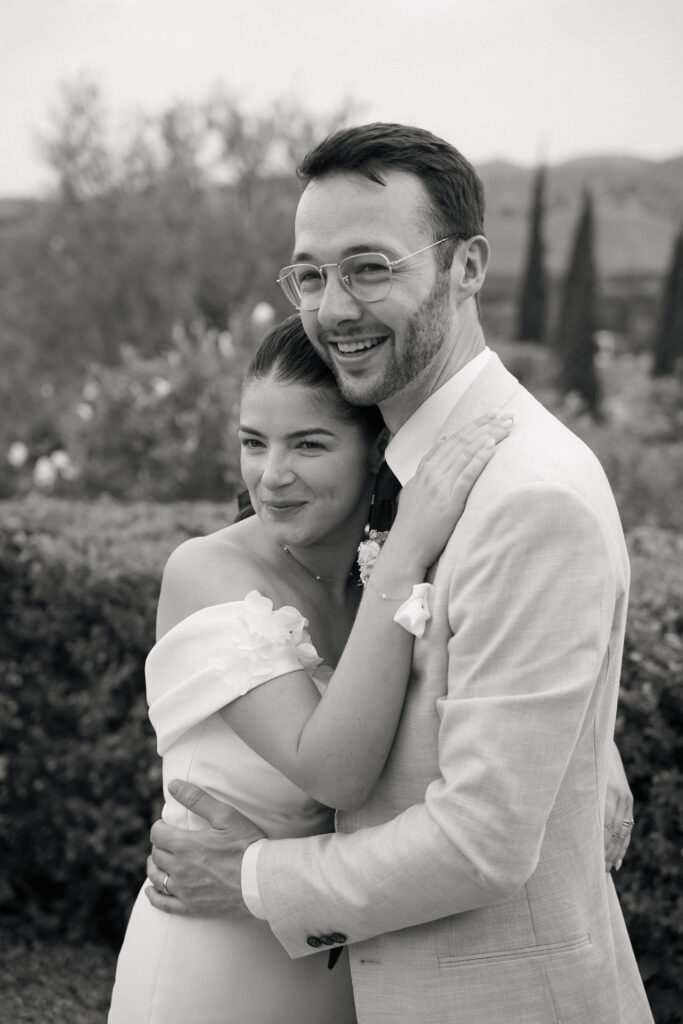 Close-up of bride and groom embracing in Spain