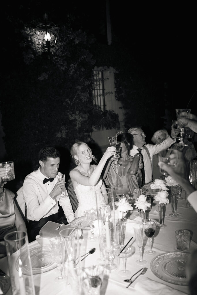 bride and groom celebrating at dinner finca son collell mallorca wedding photographer