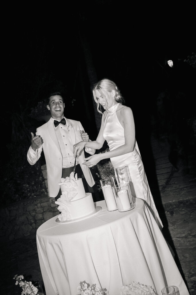 bride and groom cutting the wedding cake at finca son collell mallorca wedding photographer