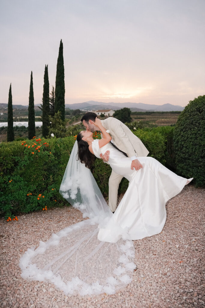 Close-up of bride and groom embracing in Spain