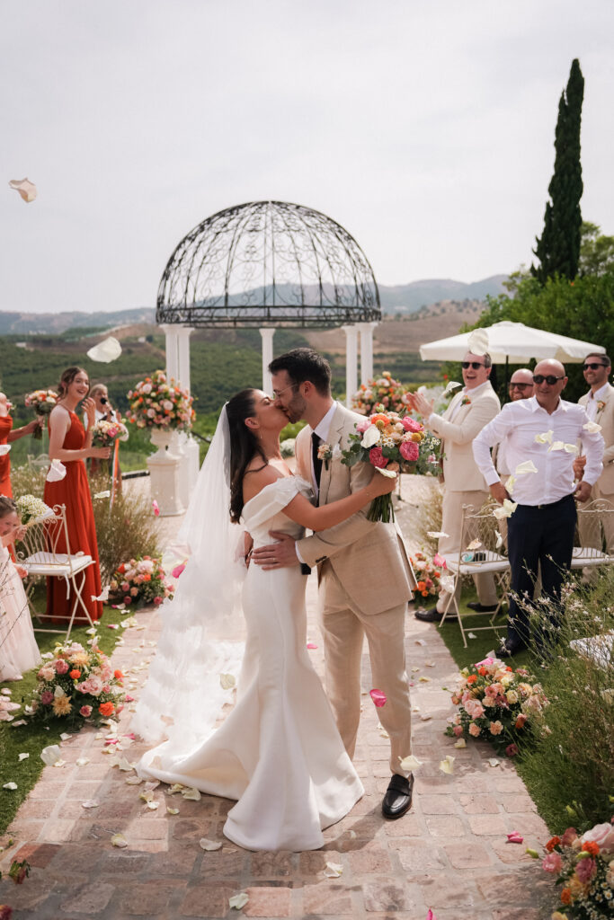 Newlyweds walking together at Cortijo Bravo wedding