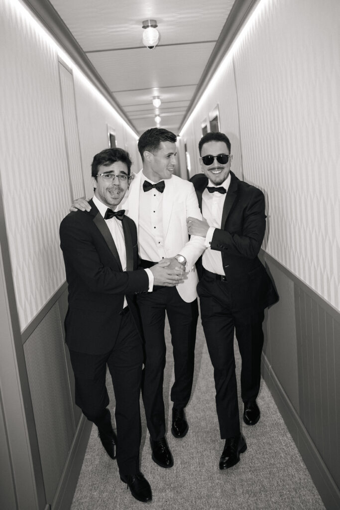 best men laughing with groom finca son collell wedding photography mallorca